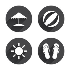 Beach holidays icons. Umbrella and sandals.