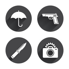 Gun weapon. Knife, umbrella and photo camera.