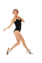 Fitness healthy women jumping in studio isolated