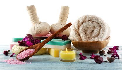 Beautiful spa composition with massage bags on light background