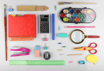 Bright stationery objects on table close up
