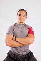 Handsome Asian man stretching