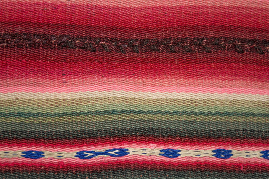 Andean weaving loom made in bright colors
