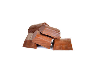 chocolate pieces on white background