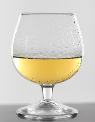 Glass of wine on grey background