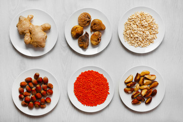 Set of different products on wooden background