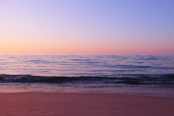Fototapeta na wymiar View of beautiful sunrise on the beach