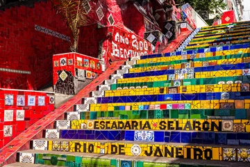 Foto op Plexiglas Escadaria Selaron in Rio de Janeiro, Brazil. Escadaria Selaron is a set of world-famous steps decorated with blue, green and yellow tiles – the colours of the Brazilian flag. © mandritoiu