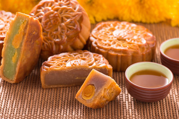 Mooncakes. Traditional Mooncake and hot tea - Chinese cake
