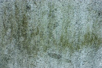 Textured walls with dirt.