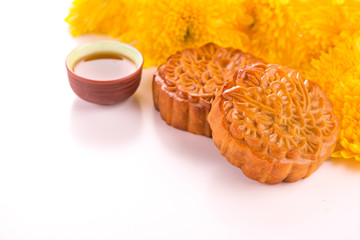 Mooncakes. Traditional Moon cake and hot tea - Chinese cake