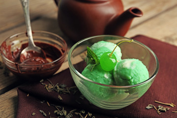 Homemade Green tea ice-cream on dark wooden background
