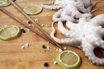 Fresh octopus food lemon salt and pepper
