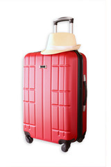 image of red elegant travel luggage and fedora hat isolated on white
