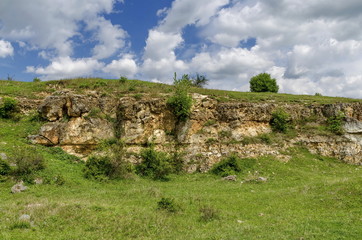 Sedimentary rock and meadow, Zavet town, Bulgaria