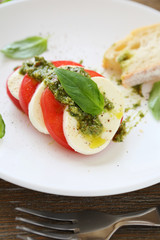 Light salad Caprese with cheese and tomato