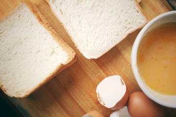 Eggs in a bowl with bread