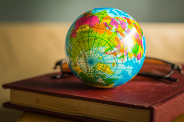 Globe on the cover of an old book