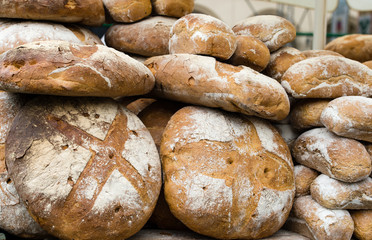 Stack of fresh bread on the market.