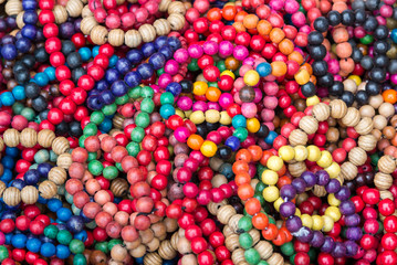 Fototapeta na wymiar The variety of wooden colorful beads.