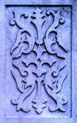 Ancient violet stone plate with vintage ornament