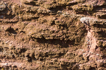 texture of red sandstone cliffs at heligoland