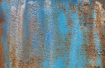 Rusty iron wall covered with paint
