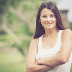 portrait of a beautiful brunette girl outdoor