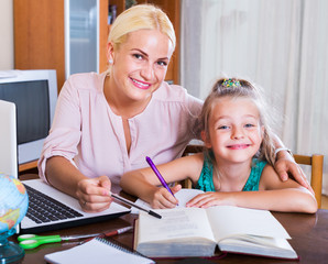 Fototapeta premium Woman and child having lesson
