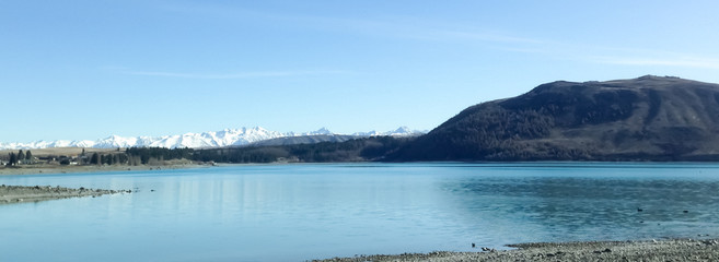 Lake with mountains covered with snow