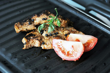 Pork meat on a grill