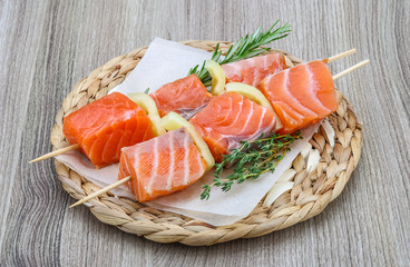 Raw salmon skewers