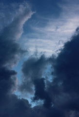 Obraz premium Blue sky with dark clouds after the storm