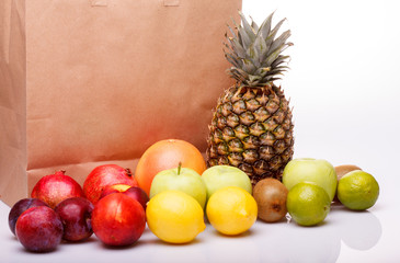 Fresh citrus fruits and packet