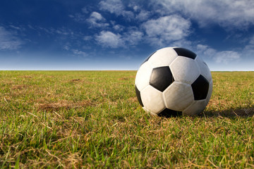 football field soccer stadium on the green grass blue sky 