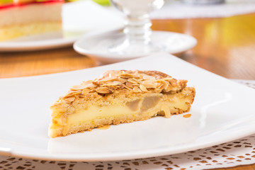 Slice of apple pie with almond
