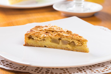 Slice of apple pie with almond