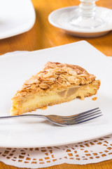 Slice of apple pie with almond
