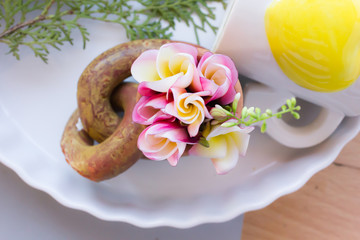 Fototapeta na wymiar lovely charming aroma flower plumeria in mini boutique style with colourful decoration