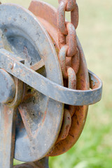 Metal chain and gears on crane