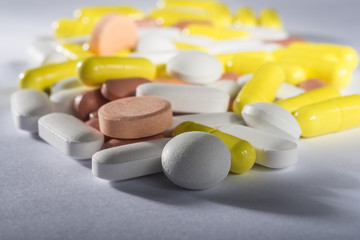 Stack of different colorful pills