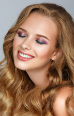 Fototapeta premium Beautiful Woman with Curly Long Hair