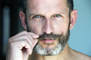 portrait of smiling man with beard