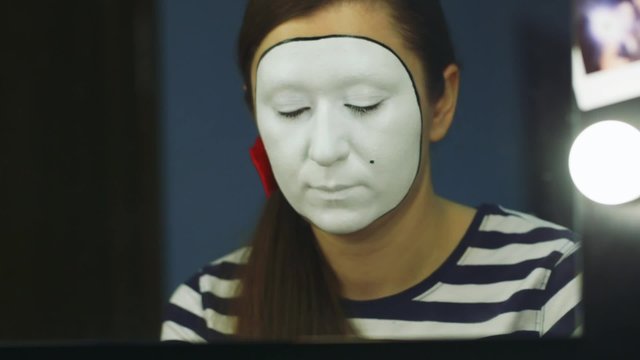 Woman mime makeup deals close-up