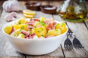 Italian food: salad with octopus, potatoes and onions