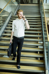 Young businessman on the stairs