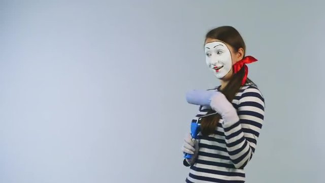 Woman mime invisible wall colors