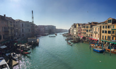 Fototapeta premium VENICE - FEBRUARY 8, 2015: Tourists along city canals. Venice at