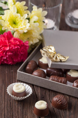 Fototapeta na wymiar chocolate candy and flowers