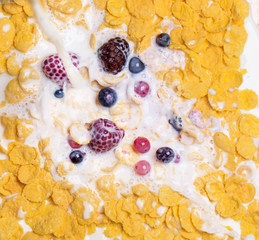 view of milk pouring into cereal